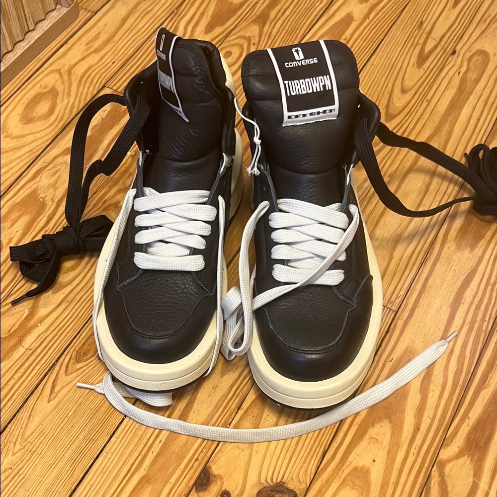 Unisex Converse Black and White Leather Sneakers